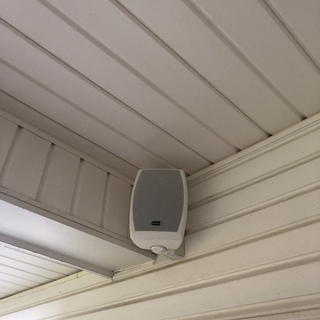 mounting outdoor speakers under eaves