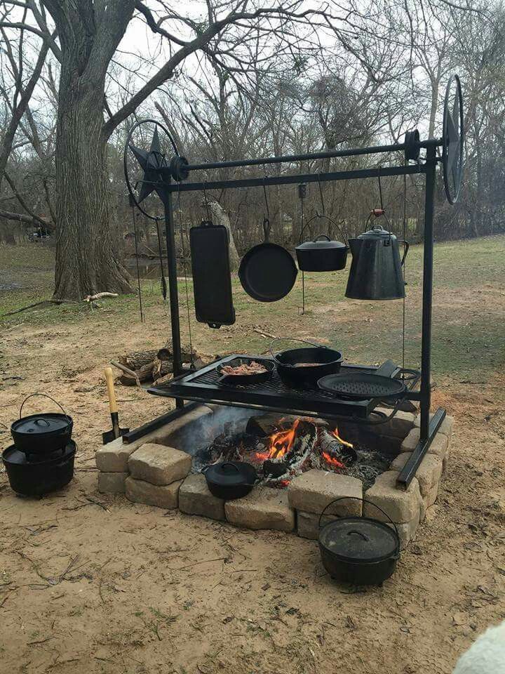 The skillet outdoors on a grill or coals to cook anything